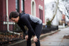 jogger leaning over rest break