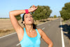 runner taking break on road